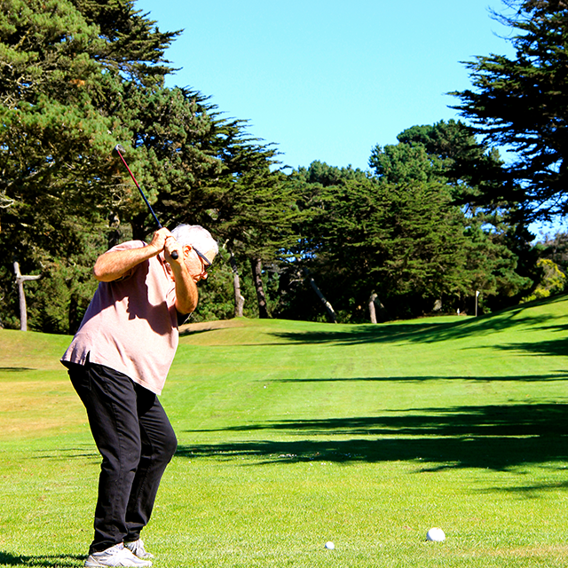 Golfer swinging