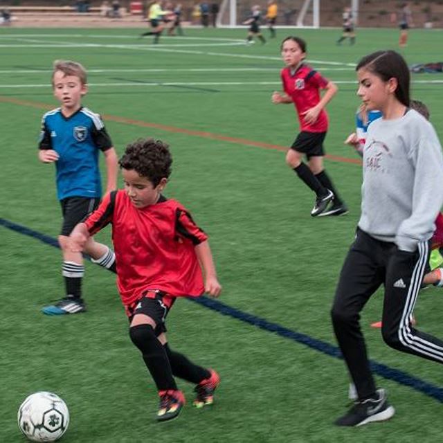 Kids playing soccer